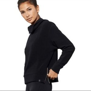 Varley Ribbed Sweater in black with gold zipper on sides